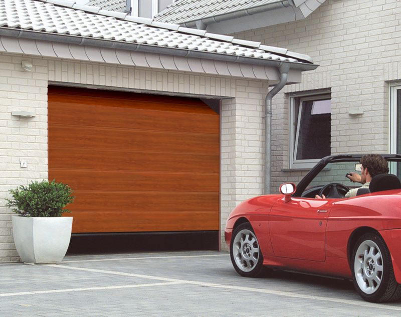 Brama garażowa segmentowa 2500 x 2125 mm ciemny dąb L z napędem Isomatic