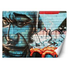 Fototapeta Feeby Graffiti na murze niebieska twarz  150x105 1 szt