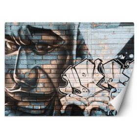 Fototapeta Feeby Niebieska twarz mężczyzny mural na cegle  200x140 1 szt
