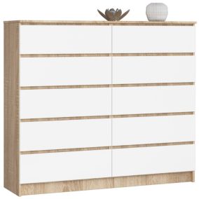Komoda Akord K140 Dąb Sonoma 138 cm 10 szuflad kolor Biały mat 138x40x121 cm 1 szt.