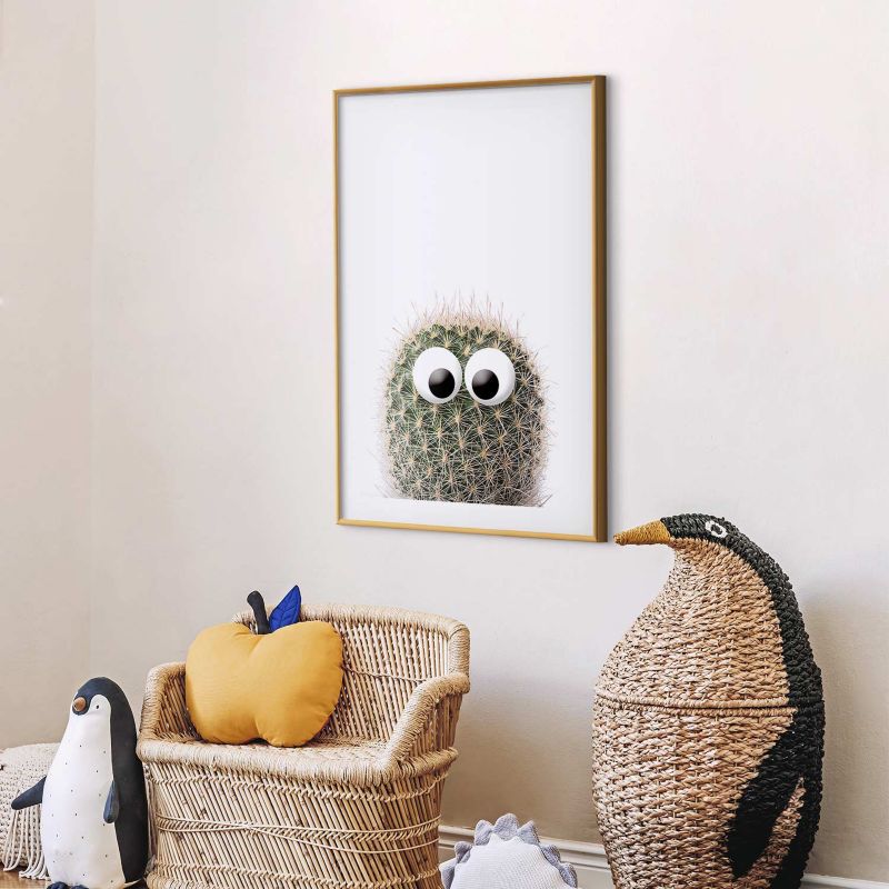Plakat Artgeist Kaktus z oczami 40x60 cm z ramą złotą 1 szt