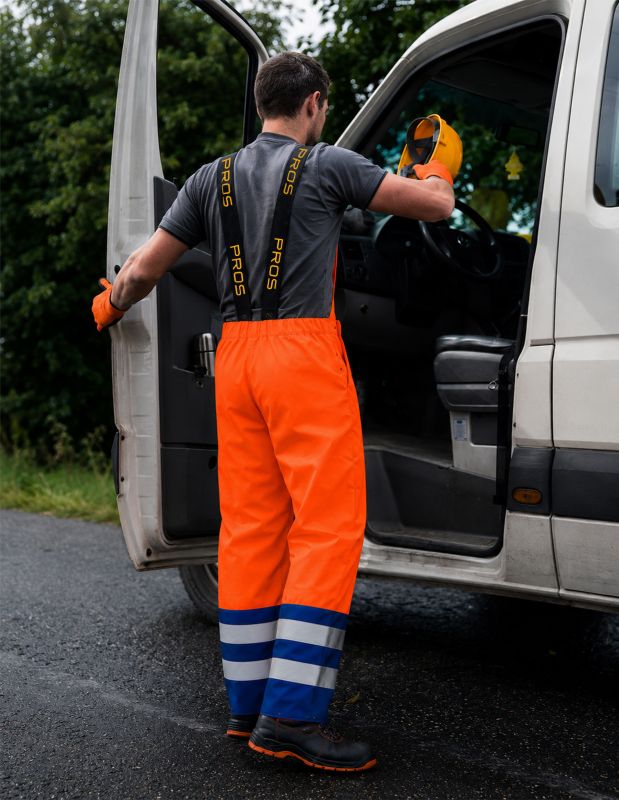 Spodnie ogrodniczki dwukolorowe model 891 R Pomarańczowy fluorescencyjny/Niebieski 56 1szt.